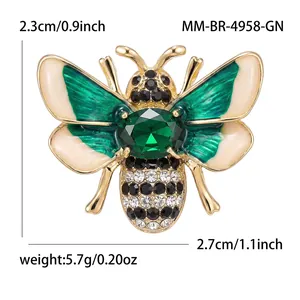Elegant alloy bee brooch with green gemstones and shiny rhinestones, size 2.7x2.3cm.