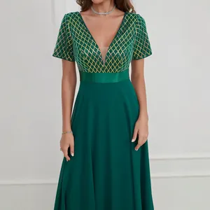 Elegant emerald green V-neck chiffon evening gown with gold sequined lattice bodice detail