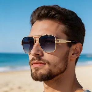 Close-up of stylish men's square frame sunglasses with double bridge on a beach model