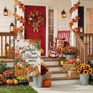 Thanksgiving garden flag with Grateful Heart text displayed in a festive porch setting