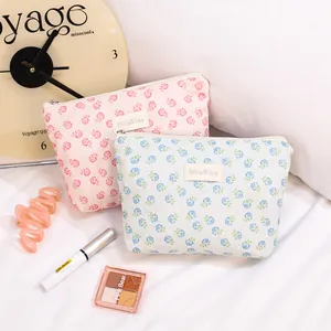 Floral mesh cosmetic bag with elegant lace patterns for makeup and skincare storage