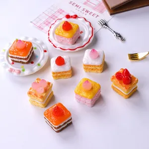 Detailed macro view of colorful miniature cake food play accessories for DIY crafts