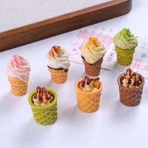 Close-up of assorted miniature ice cream cones and dessert cups for DIY decoration