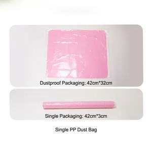 Detail view of the pink silicone placemat packaging in both flat and rolled states.