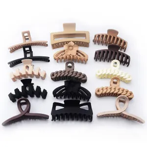 Variety pack of matte hair claw clips in neutral and earthy tones collection