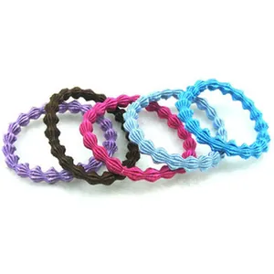Detailed view of colorful wavy textured elastic hair ties in five vibrant shades.