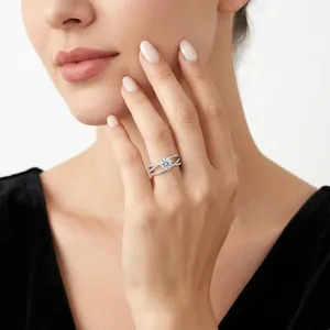 Elegant S925 sterling silver moissanite ring with a crisscross pavé band on model