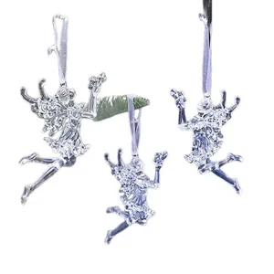 Set of three clear acrylic fairy angel Christmas ornaments hanging on white background.