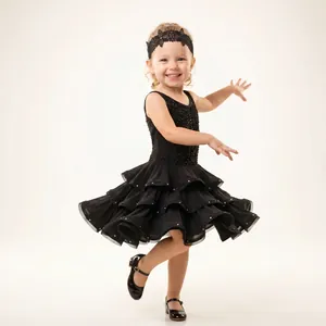 Close-up detail of children's black lace floral headband for Latin dance costume