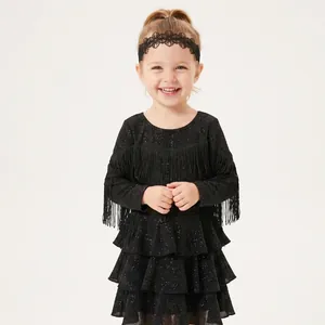 Young girl wearing a black hollow lace headband with embroidered flower details