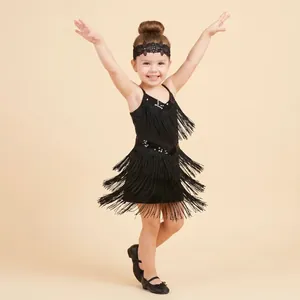 Detailed view of children's black lace floral headband for Latin dance performance.