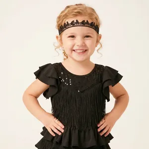 Close-up of a child wearing a black hollow lace embroidered headband for Latin dance