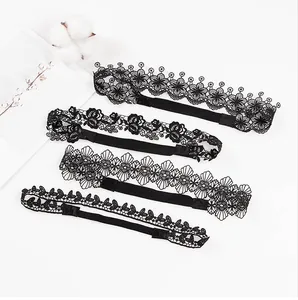 Set of four black lace headbands with embroidered floral and leaf patterns for kids