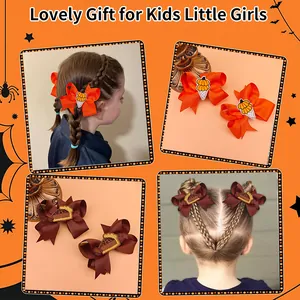 Detailed views of embroidered Thanksgiving bow hair clips for kids in orange and brown