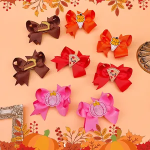 Thanksgiving embroidered bow hair clips set for girls featuring pumpkin and pie patterns