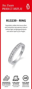 Elegant 925 sterling silver band ring with multiple sparkling moissanite stones.