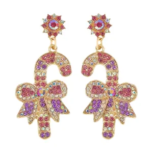 Festive Christmas candy cane drop earrings featuring colorful rhinestones and a bow
