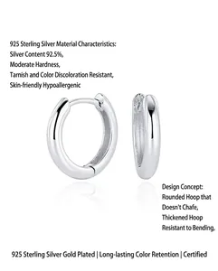 Close-up of minimalist S925 sterling silver hoop earrings with a smooth polished finish