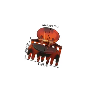 Detailed view of 4cm brown tortoiseshell hair claw clip with size and weight labels