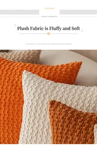 Close-up detail of soft plush bubble textured pillowcases in vibrant orange and white