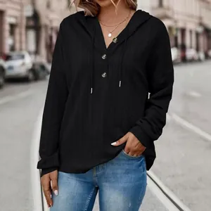 Women's loose black solid color hooded long sleeve hoodie with button neckline