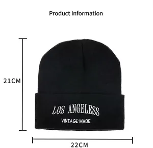 Close-up detail showing the exact dimensions of this black embroidered letter beanie hat