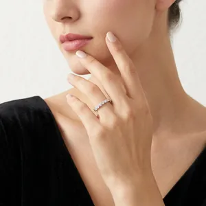Elegant S925 sterling silver moissanite eternity ring worn by a model for a chic look
