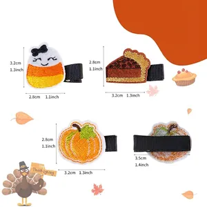 Detailed size guide for Thanksgiving embroidered hair clips featuring pumpkin and ghost designs