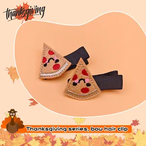 Close-up of cute embroidered pizza hair clips for Thanksgiving kids' hair accessories