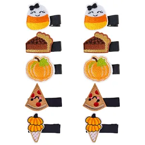 Thanksgiving themed embroidered hair clips set for baby girls pumpkin and pie designs