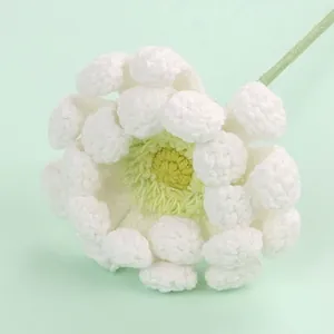 Elegant white and yellow hand-knitted crochet flower with green stem for gift decoration