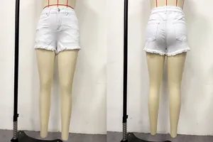 Detailed front and back views of distressed white denim shorts with frayed hems on mannequin.