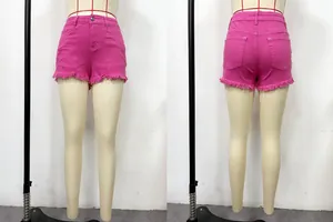 Front and back view of hot pink distressed denim shorts with raw hem on mannequin.