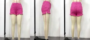 Detailed multi-angle view of pink distressed low waist denim shorts with frayed hems
