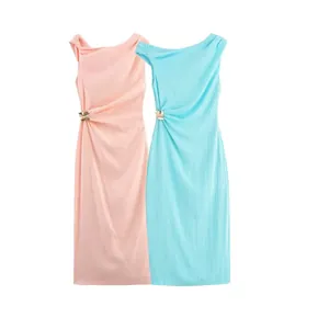 Elegant asymmetric midi dresses with gold metal embellishments in pastel pink and blue colors