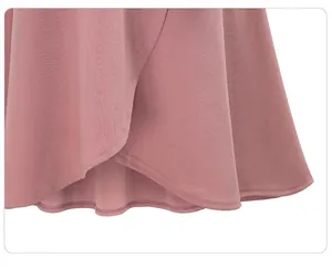 Detailed close-up showing the irregular hemline and fabric texture of this pink skirt