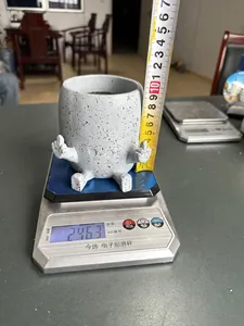 Funny middle finger resin flower pot with measurements showing weight and height