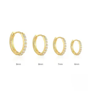 Detailed comparison of four sizes of gold hoop earrings with clear cubic zirconia stones