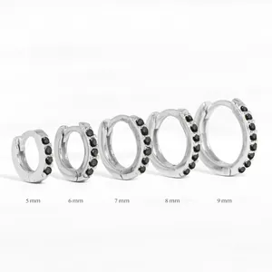 Side-by-side comparison of silver hoop earrings with black stones from 5mm to 9mm