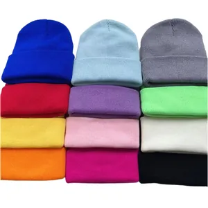 Collection of colorful solid knit beanies in vibrant candy tones for winter warmth.
