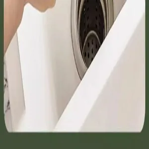 Detailed close-up showing the white plastic rim of a multi-functional rice washing basket