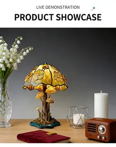 Detail view of a magical resin mushroom lamp on a cozy wooden table setting