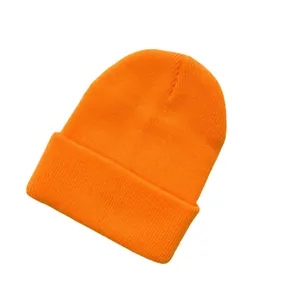 Vibrant neon orange knit beanie hat with classic ribbed texture and folded cuff