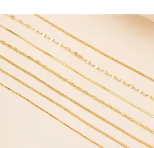 Detailed view of seven different styles of gold-plated necklace chains for DIY jewelry
