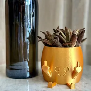 Funny golden resin planter pot with middle finger hands for home and garden decor