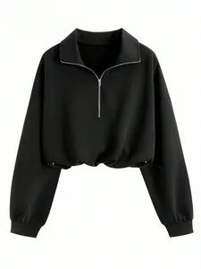 Front view of black half-zip sweatshirt with lapel collar and cinched waist detail