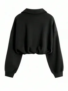 Back view of a black half-zip cropped sweatshirt with a lapel collar and drawstring waist.