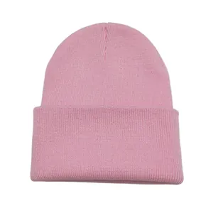 Classic pink knit beanie hat with cuffed design for winter warmth and stylish daily wear