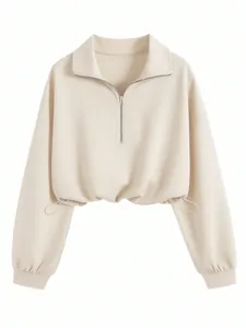 Women's cream half-zip polo sweatshirt with adjustable drawstring waist and long sleeves