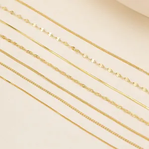 Collection of various gold-plated silver chains including snake, box, and water wave styles